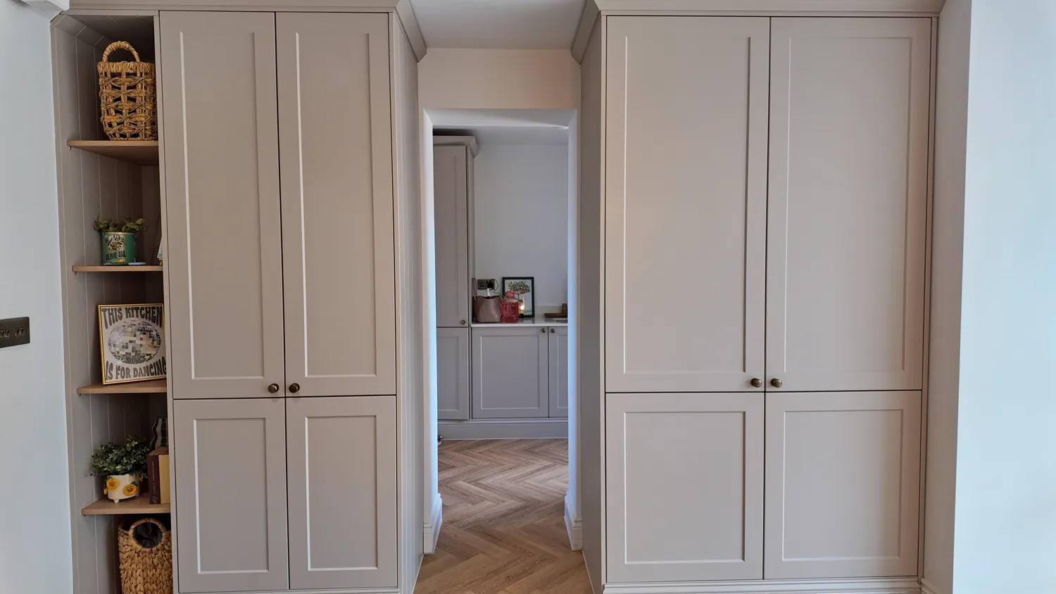 Floor to ceiling painted storage joinery fitted by Madisons