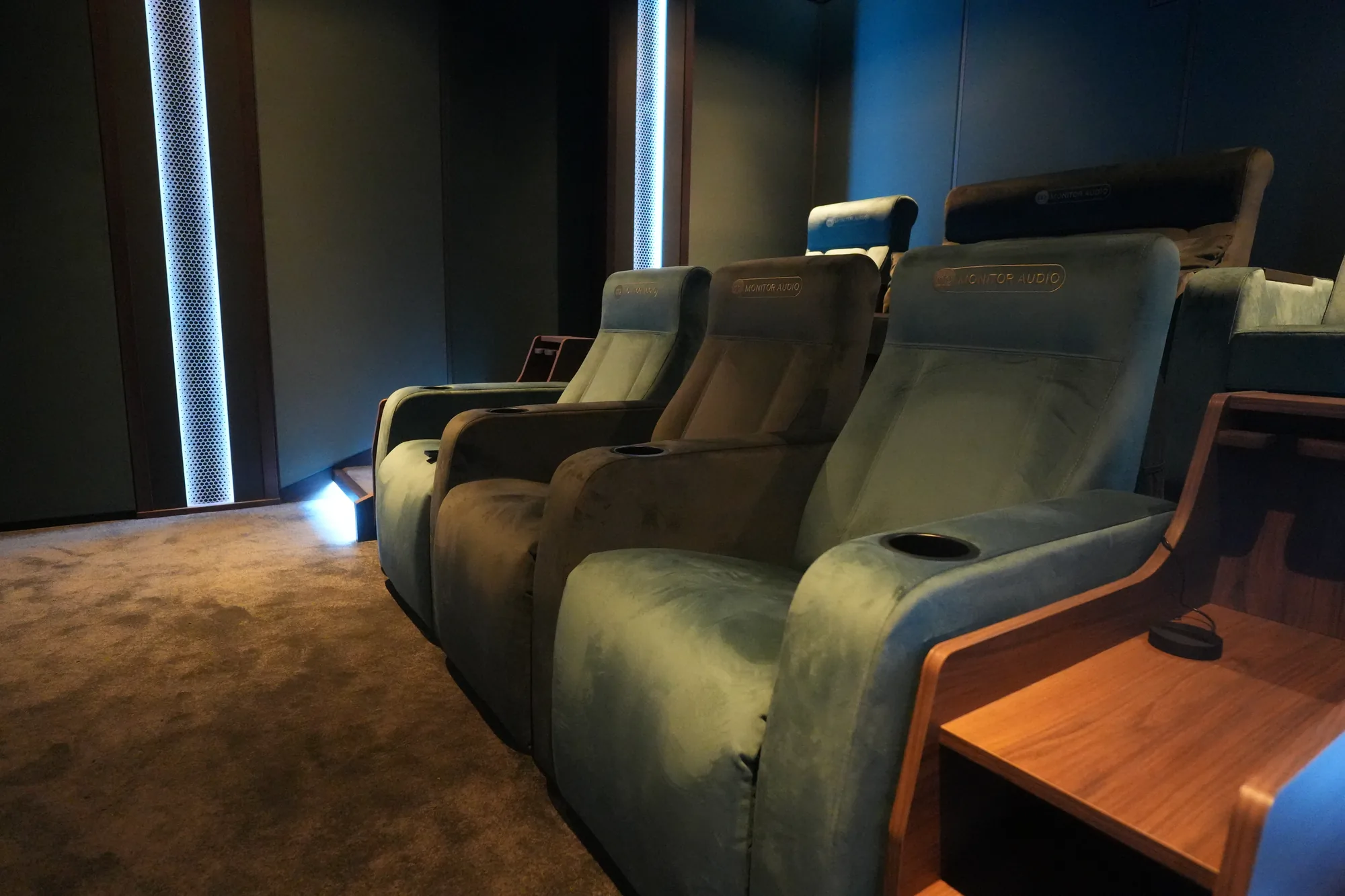 Velvet cinema seating rows in the Monitor Audio show unit