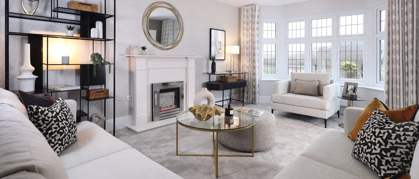 Finished show home lounge with fireplace and bay window at Hazel Park, Stevenage