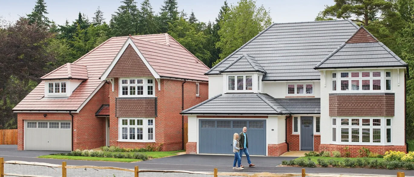 Two detached Redrow homes with garages at Mandeville Crescent, Saffron Walden