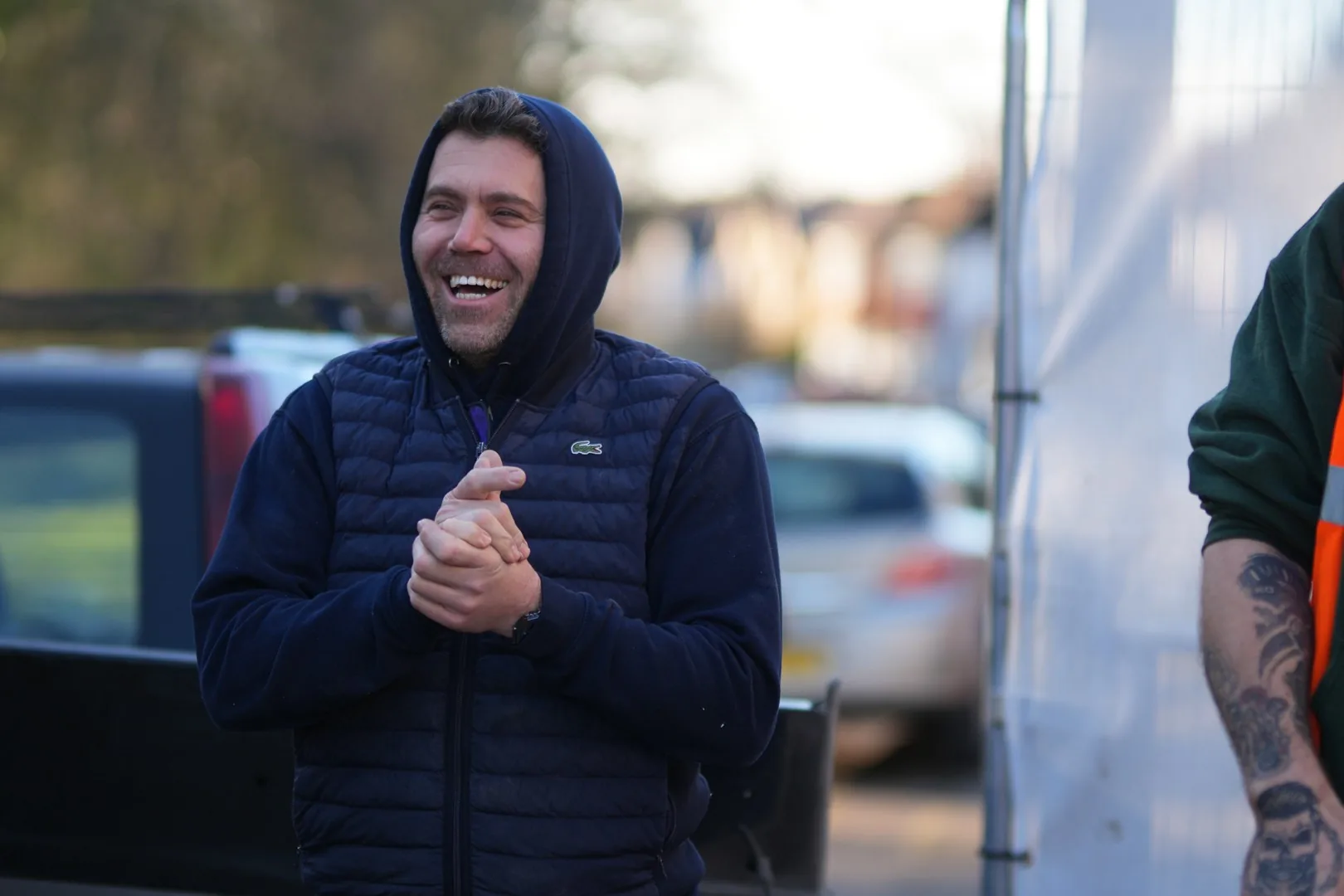 A smiling operative at the entrance to the Chigwell site.